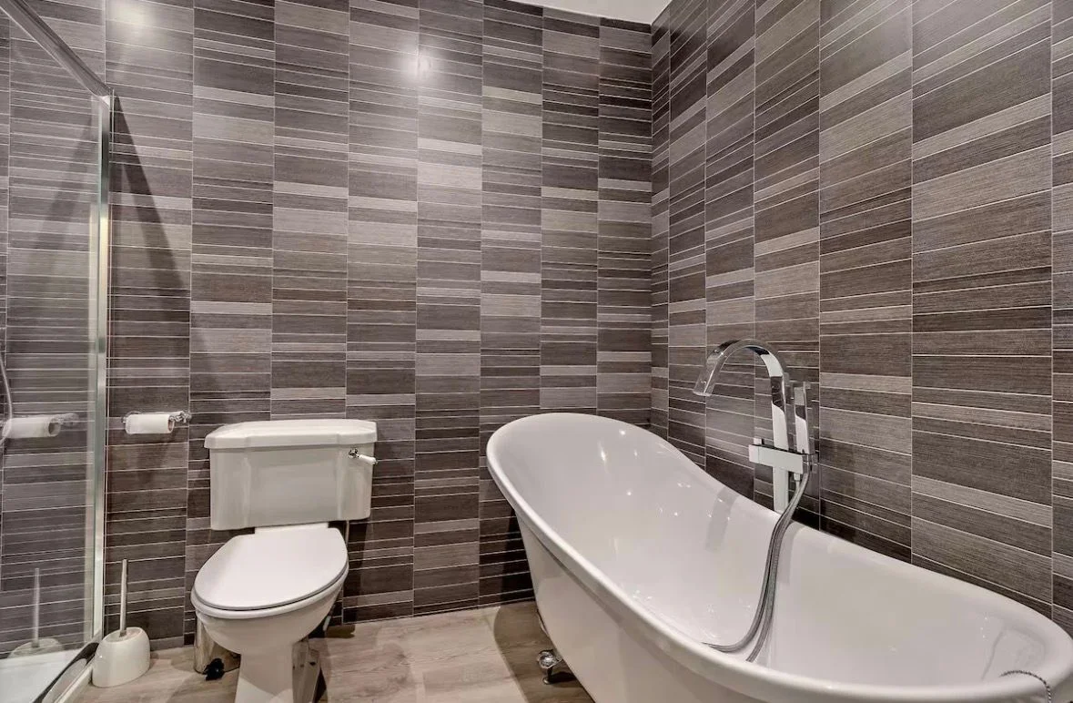 Bathroom with freestanding bath