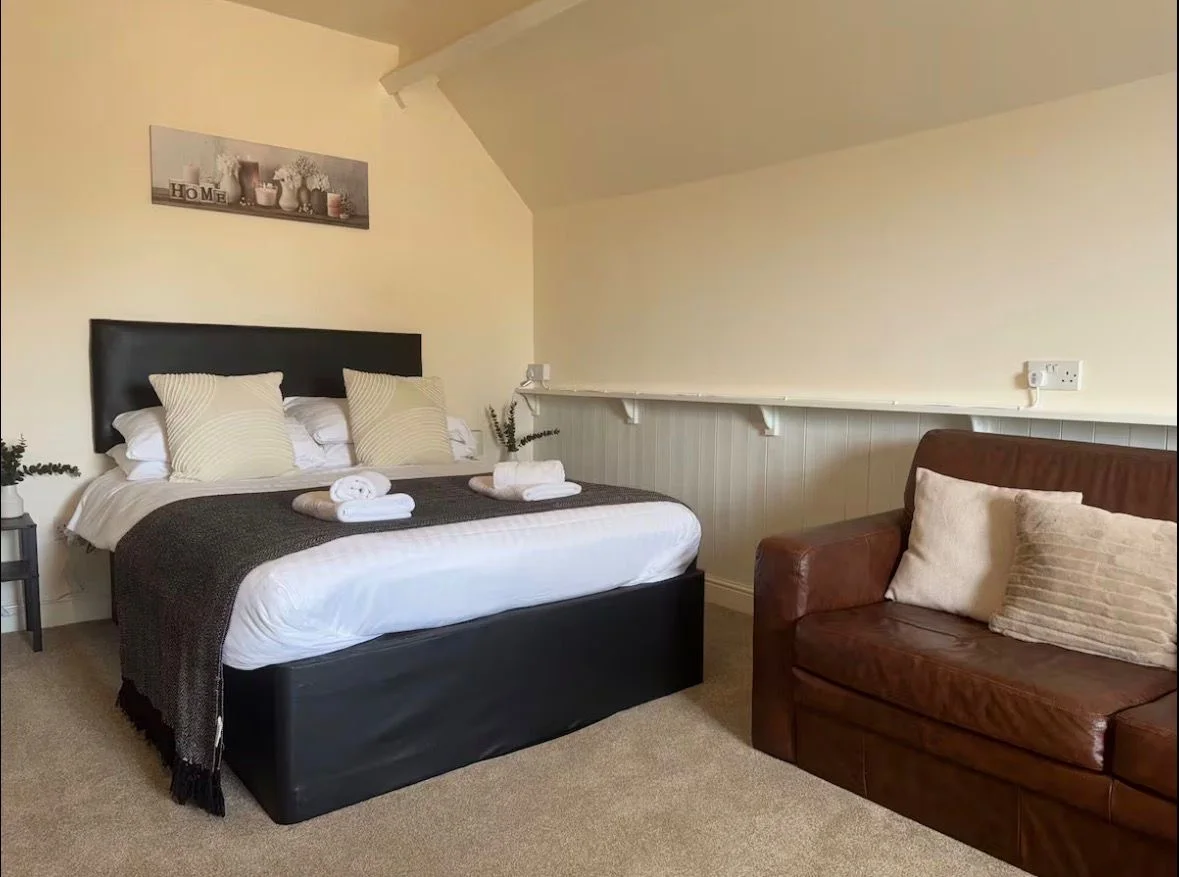 Large bedroom with additional seating