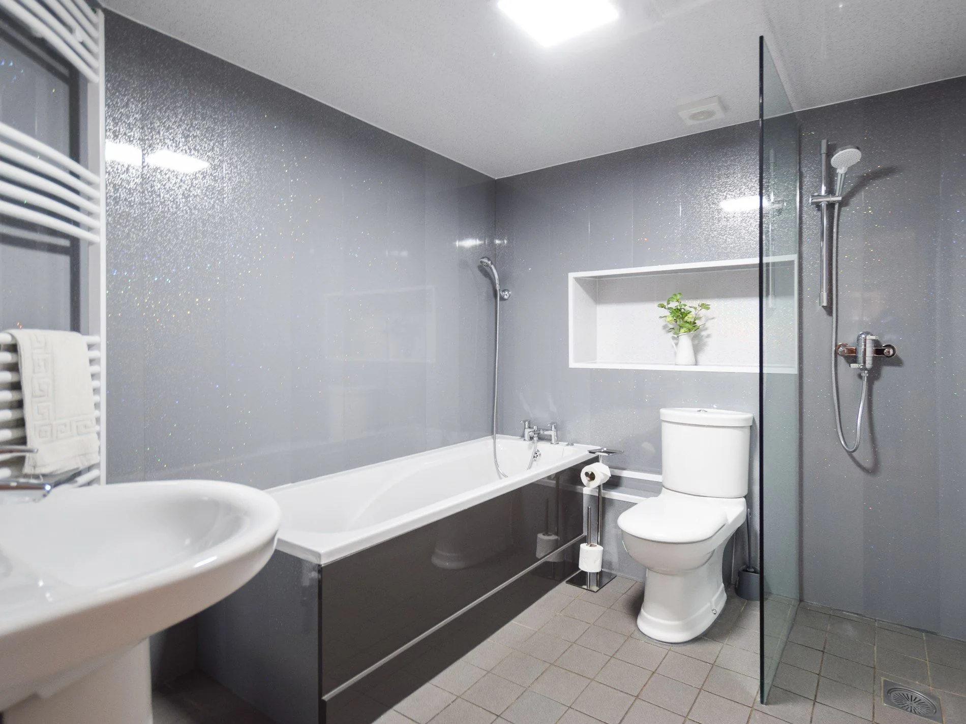 Modern bathroom with bath and walk-in shower
