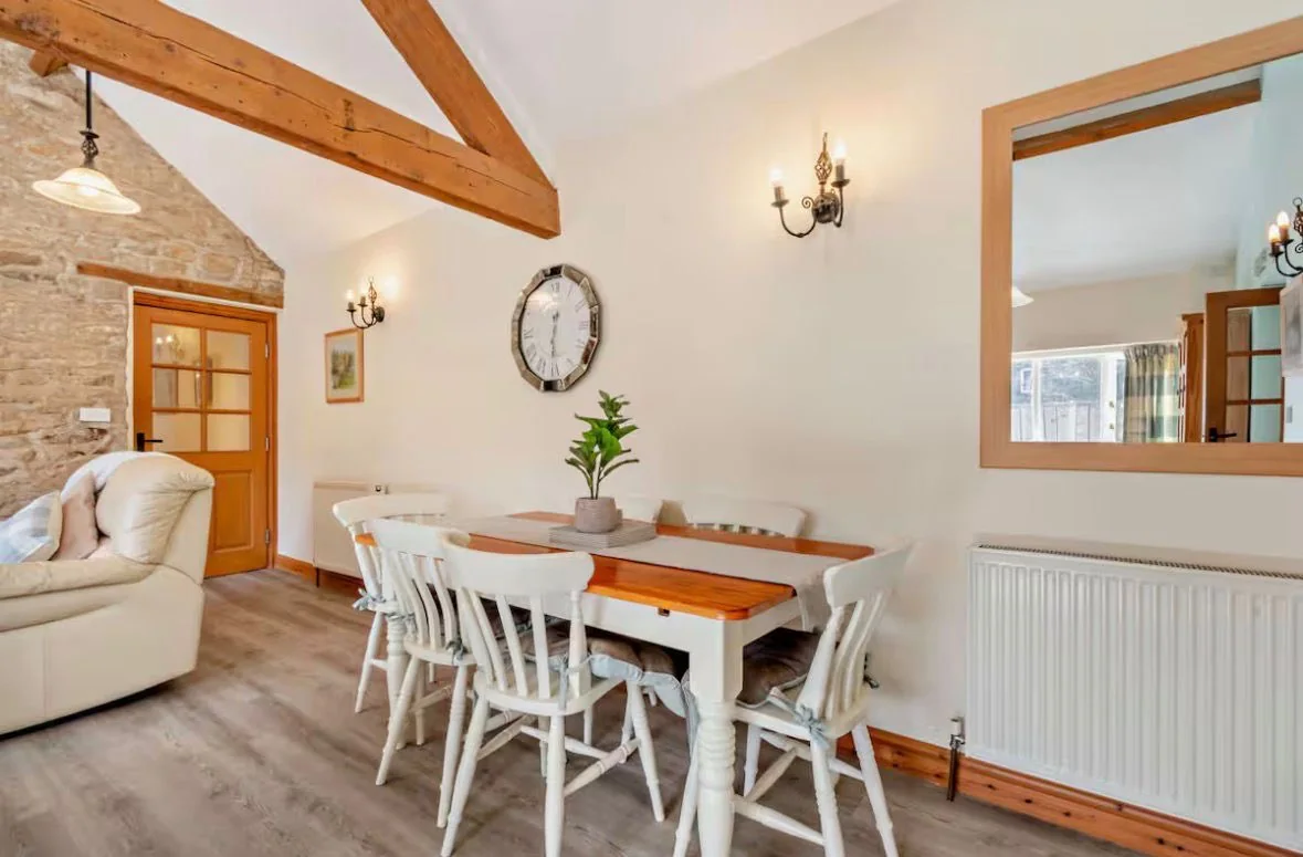 Dining space within the vaulted living room