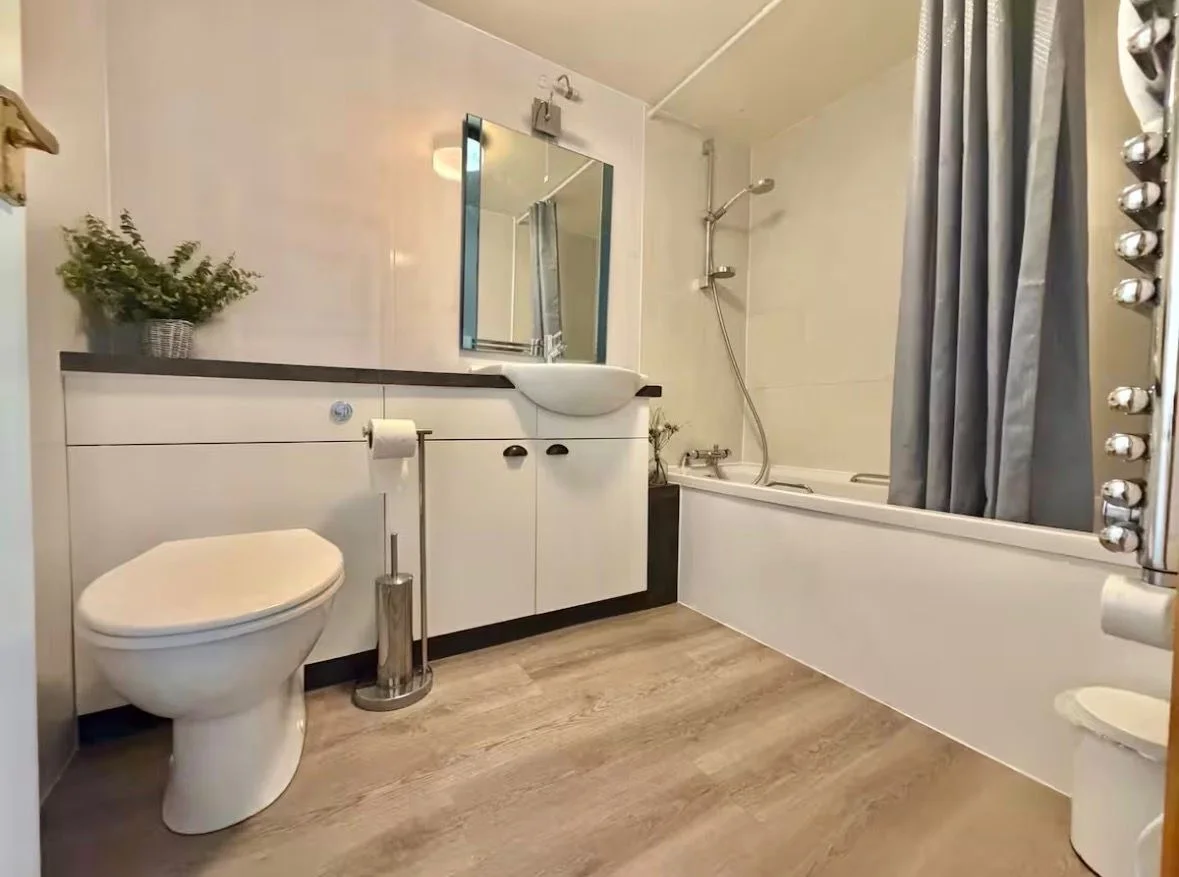 Family bathroom with bath