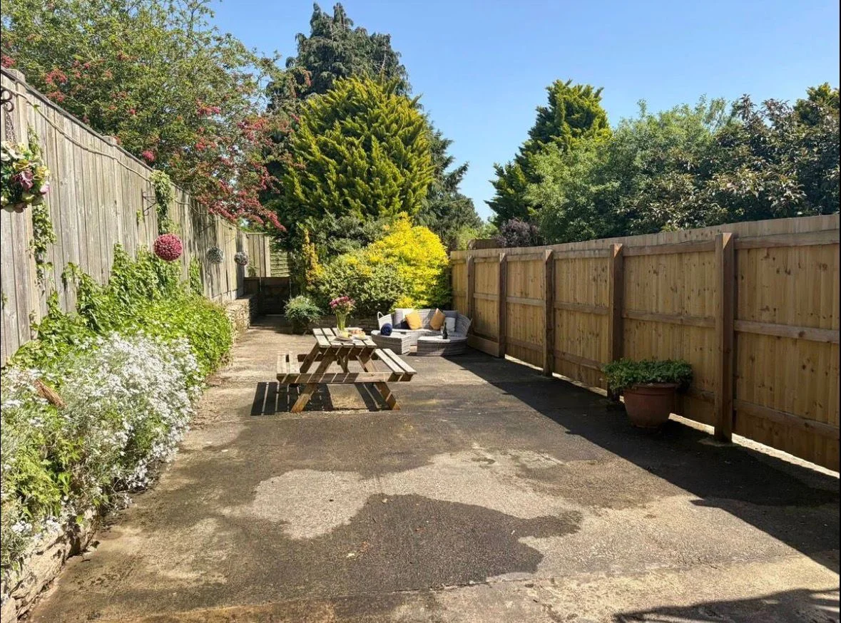 Private enclosed garden with seating